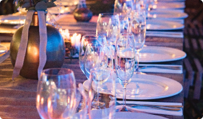Table Set For Dinner: Glasses,Plates, and Utensils Arranged Elegantly