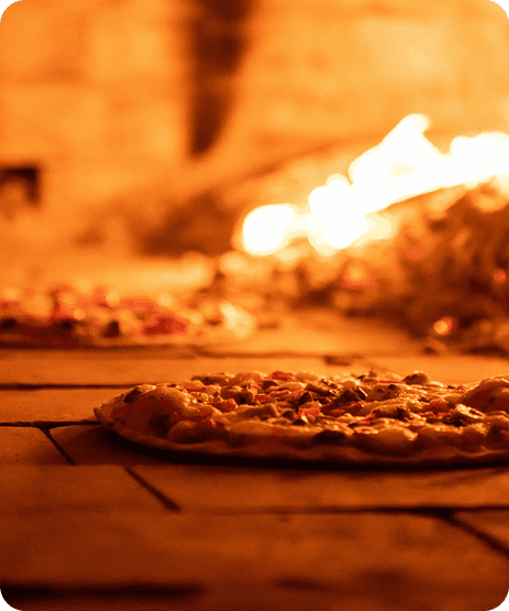 Pizza Cooked in Wood Fire