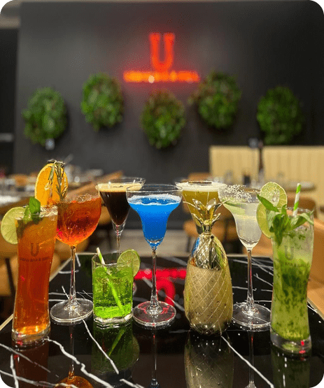 Various Glasses Filled With Different Types Of Drinks