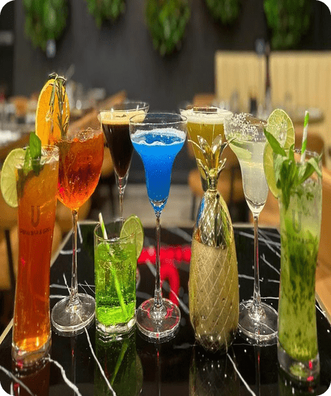 Various Glasses Filled With Different Types Of Drinks