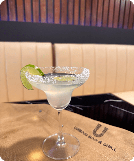 A refreshing mojito cocktail with a twist of lemon